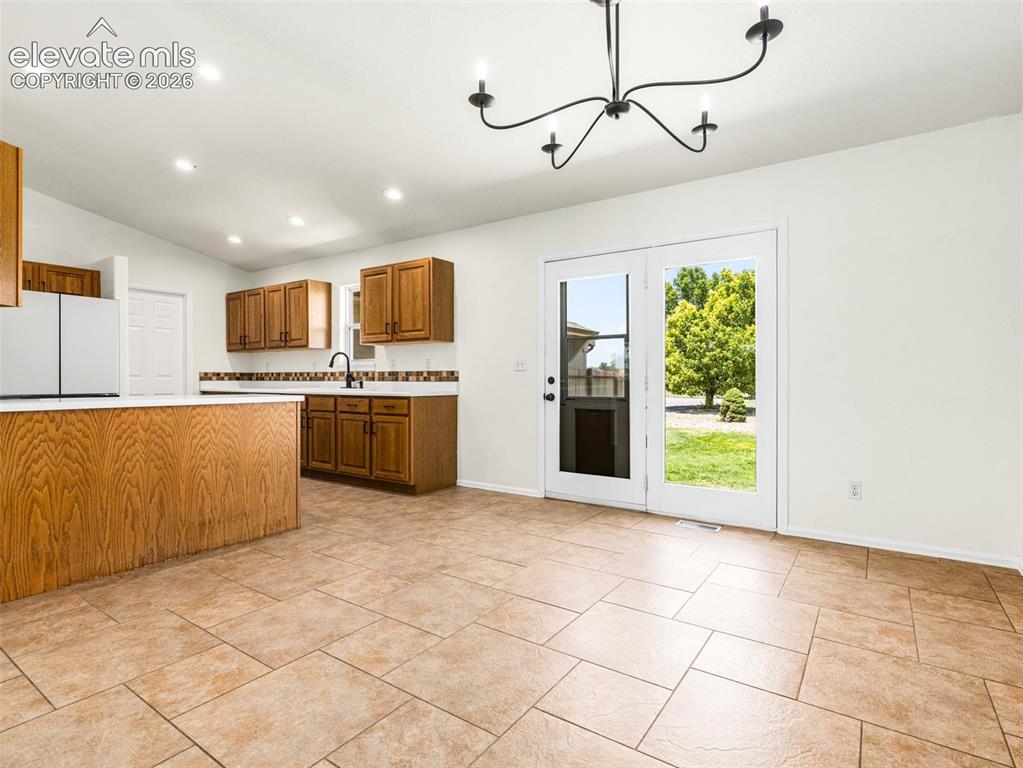 Image 12 of 50: This large space holds a large table
