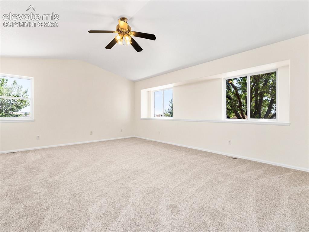 Image 14 of 50: This room is huge! New carpet, fresh paint with a 5pc bath, walk in closet