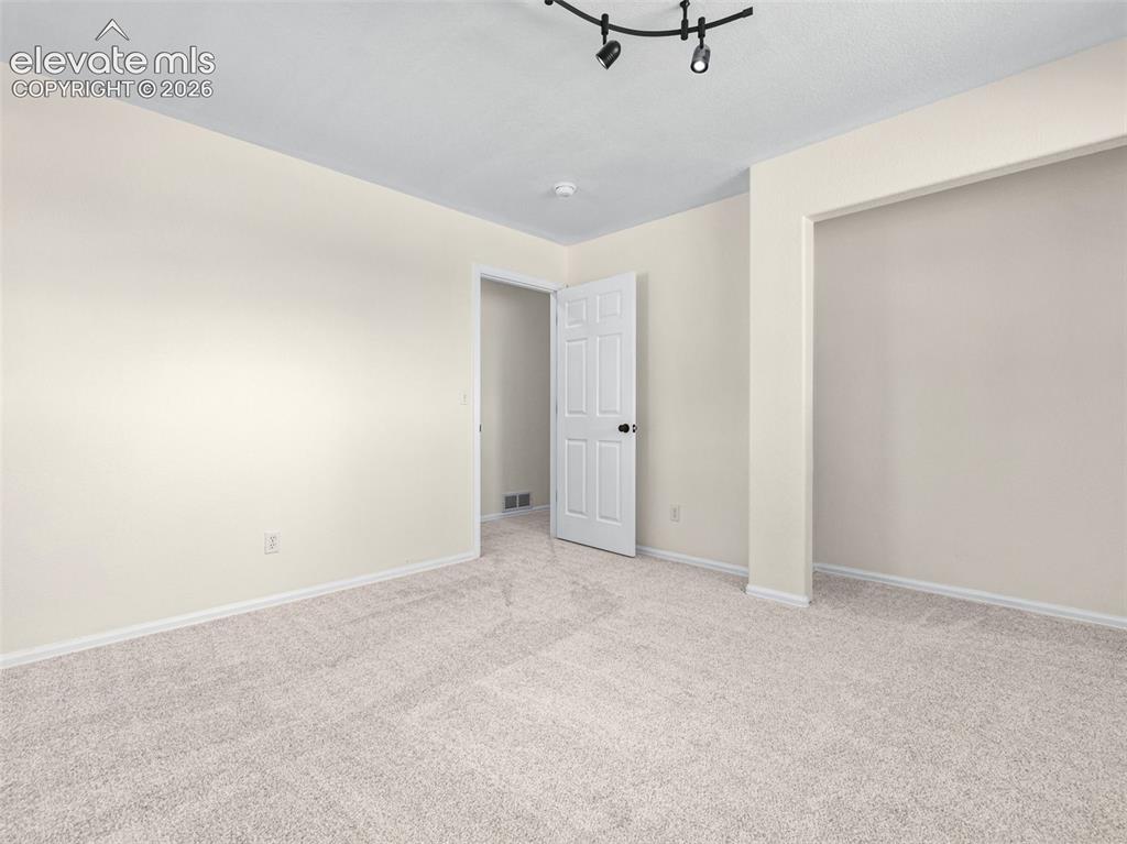 Image 21 of 50: New carpet, fresh paint in bedroom 2