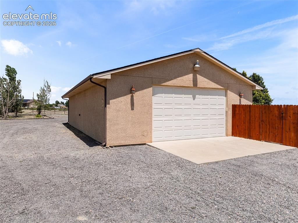 Image 41 of 50: This is a 1500 sq ft outbuilding with drive through accessibility, 10ft doo