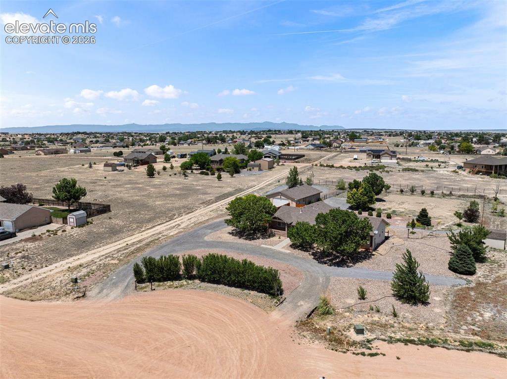 Image 44 of 50: Full 4.85 acres with spectacular mountain views, sits on a cul de sac and j