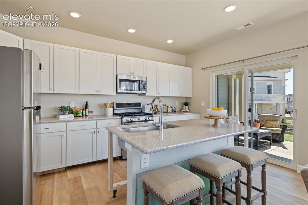 Image 12 of 34: Open kitchen