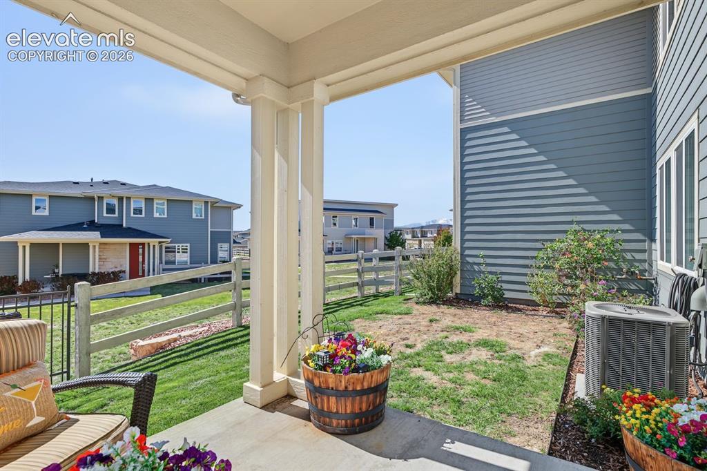 Image 15 of 34: View from back covered patio.