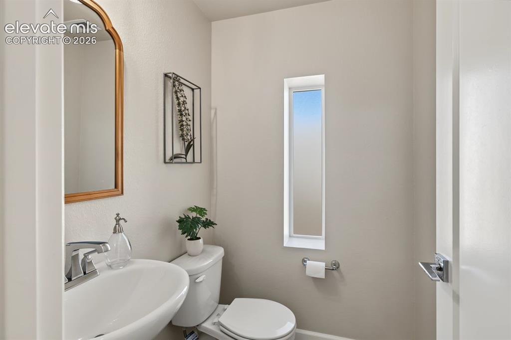 Image 17 of 34: Half bath on main level