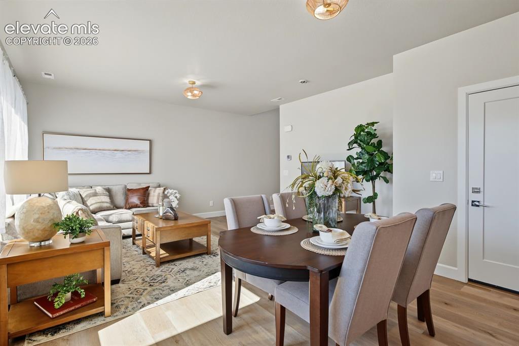 Image 31 of 34: Spacious dining with extra seating at the bar