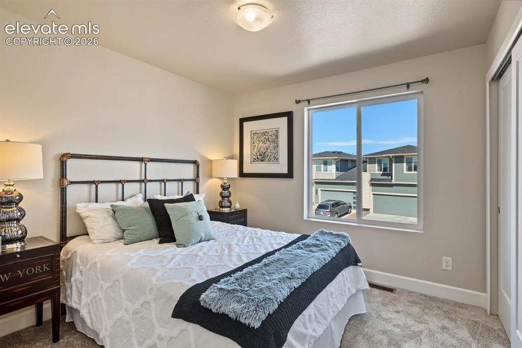 Image 4 of 34: Second bedroom