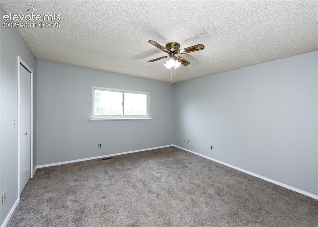 Image 15 of 38: Master bedroom