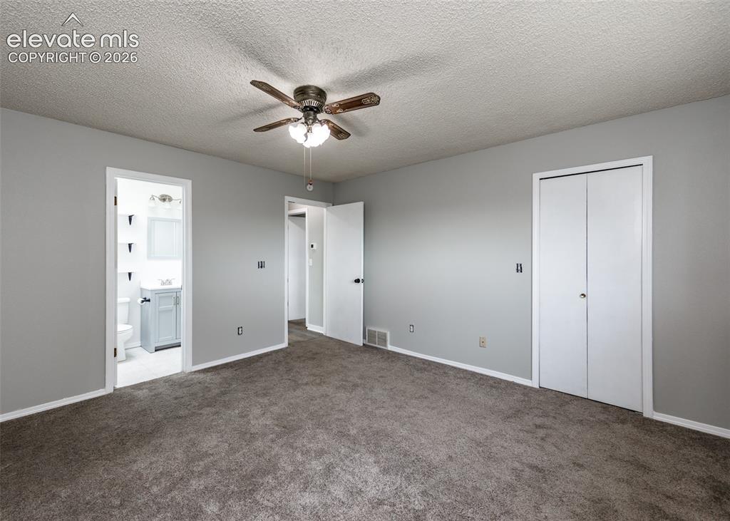 Image 16 of 38: Master bedroom