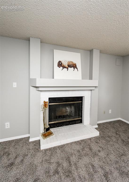 Image 24 of 38: Fireplace in family room