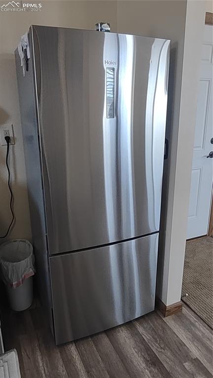 Image 18 of 38: Stainless refrigerator.