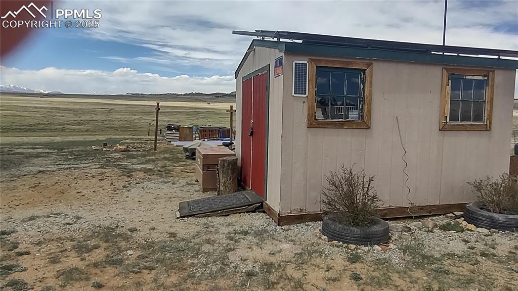 Image 25 of 38: Combo solar shed, storage & workshop.