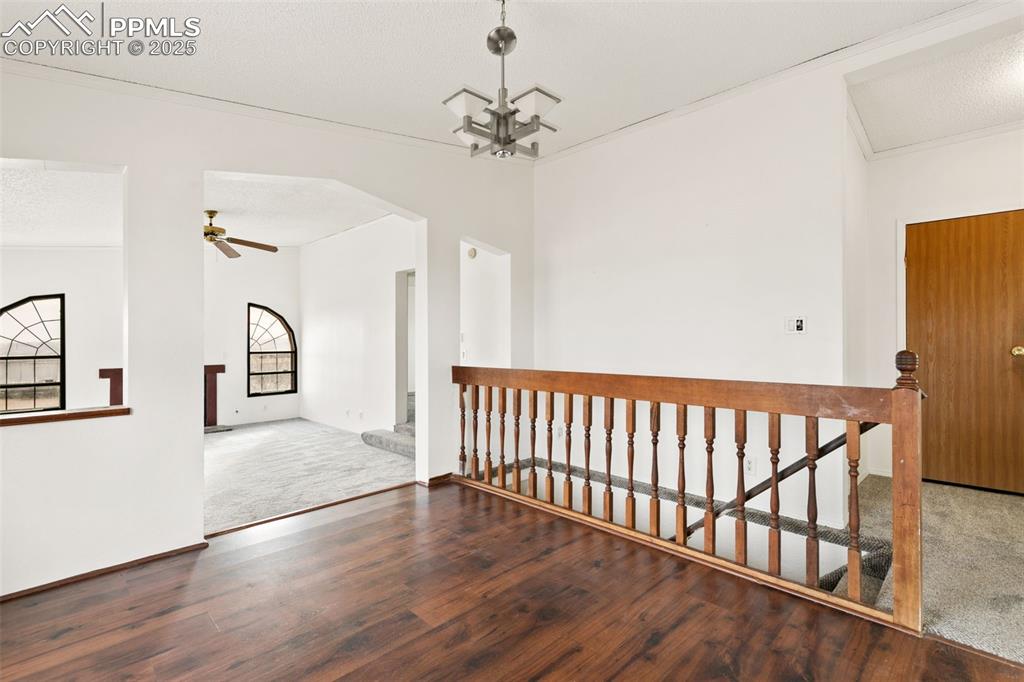 Image 14 of 50: Dining looking into the sunken family room with FP