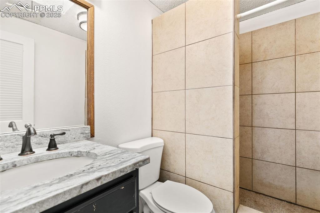 Image 28 of 50: Additional main level bathroom