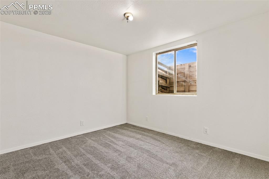Image 39 of 50: 4th bedroom in basement