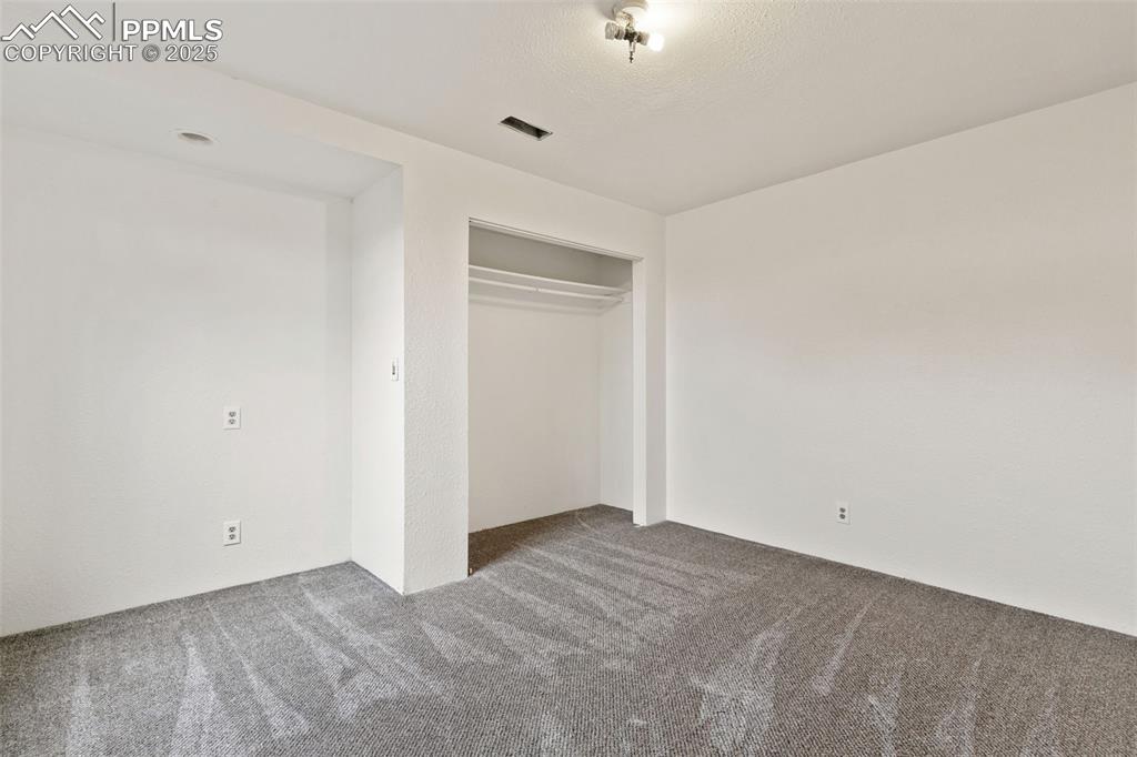 Image 41 of 50: 5th bedroom in basement