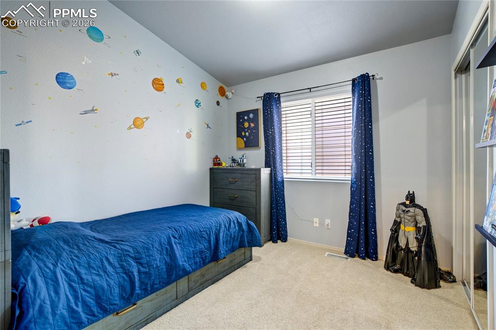 Image 18 of 49: Bedroom