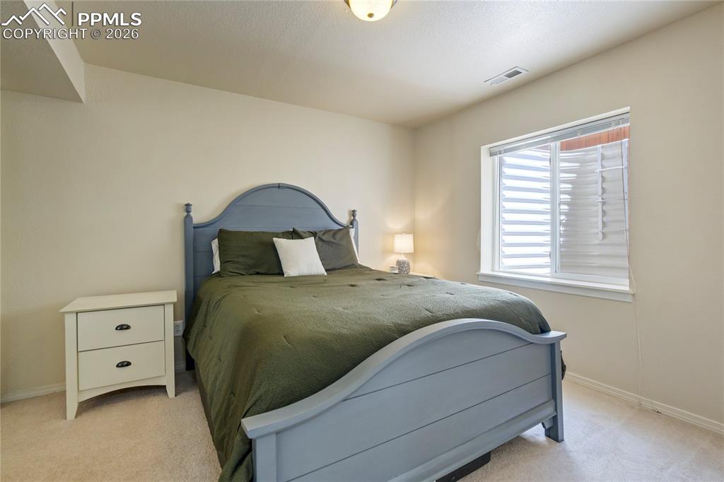 Image 36 of 49: Bedroom