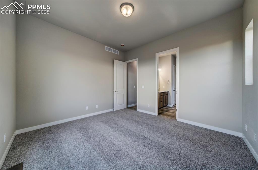 Image 18 of 34: Master Bedroom