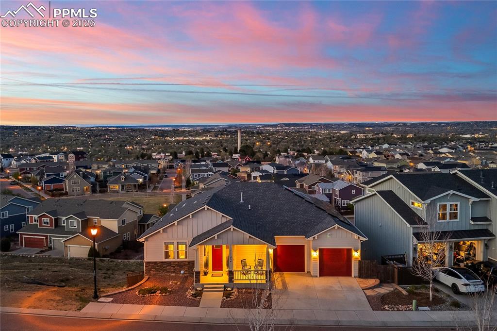 Image 2 of 50: View of the back of home with 2 decks