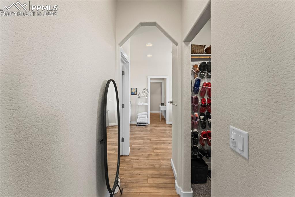 Image 25 of 50: Main level primary bedroom walk in closet