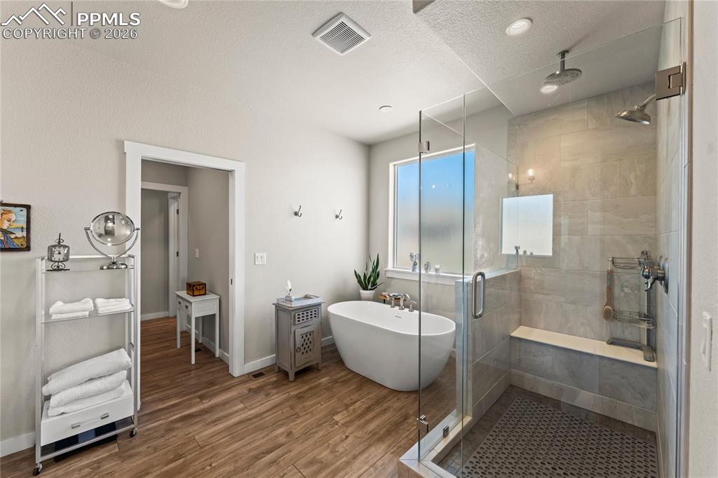 Image 26 of 50: Main level primary bathroom