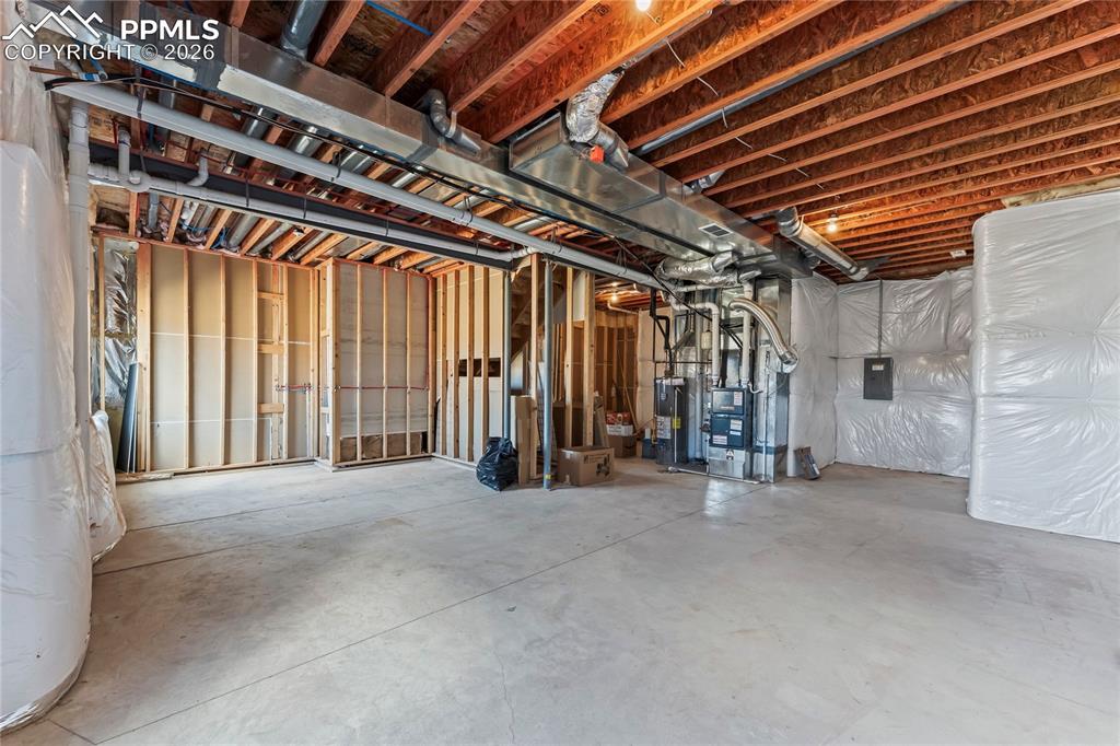 Image 38 of 50: Large unfinished basement area