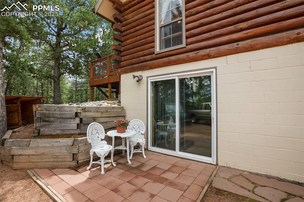 Image 33 of 36: View of patio / terrace with a deck