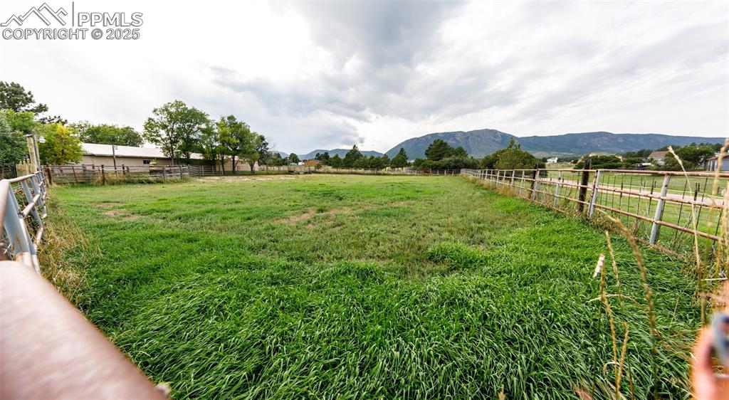 Image 37 of 41: View of yard featuring a rural view and a mountain view