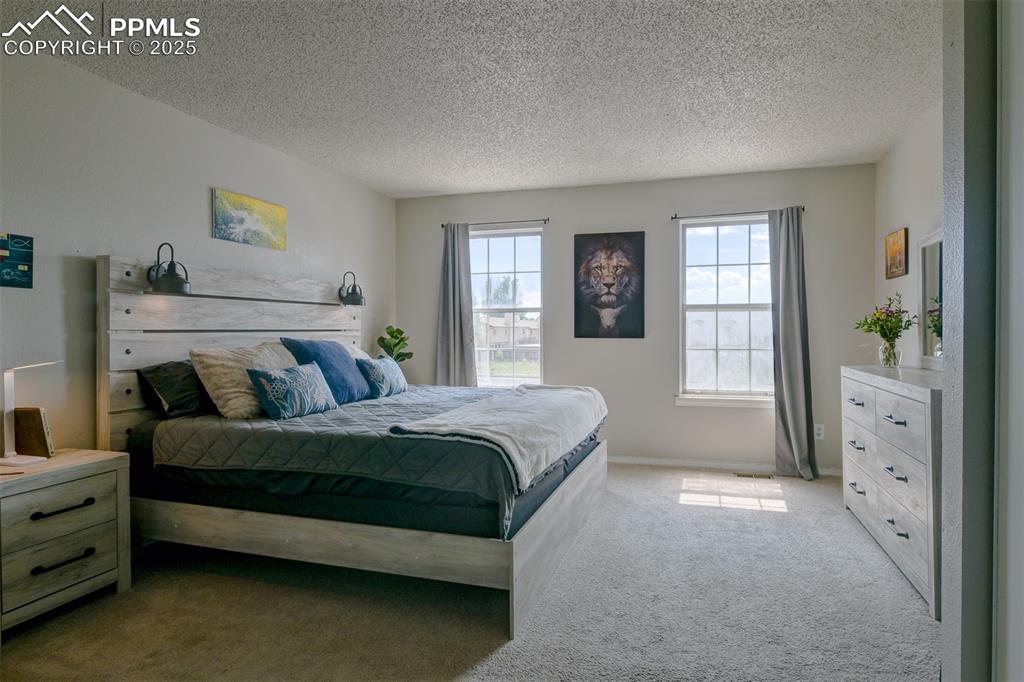 Image 16 of 34: Master Bedroom