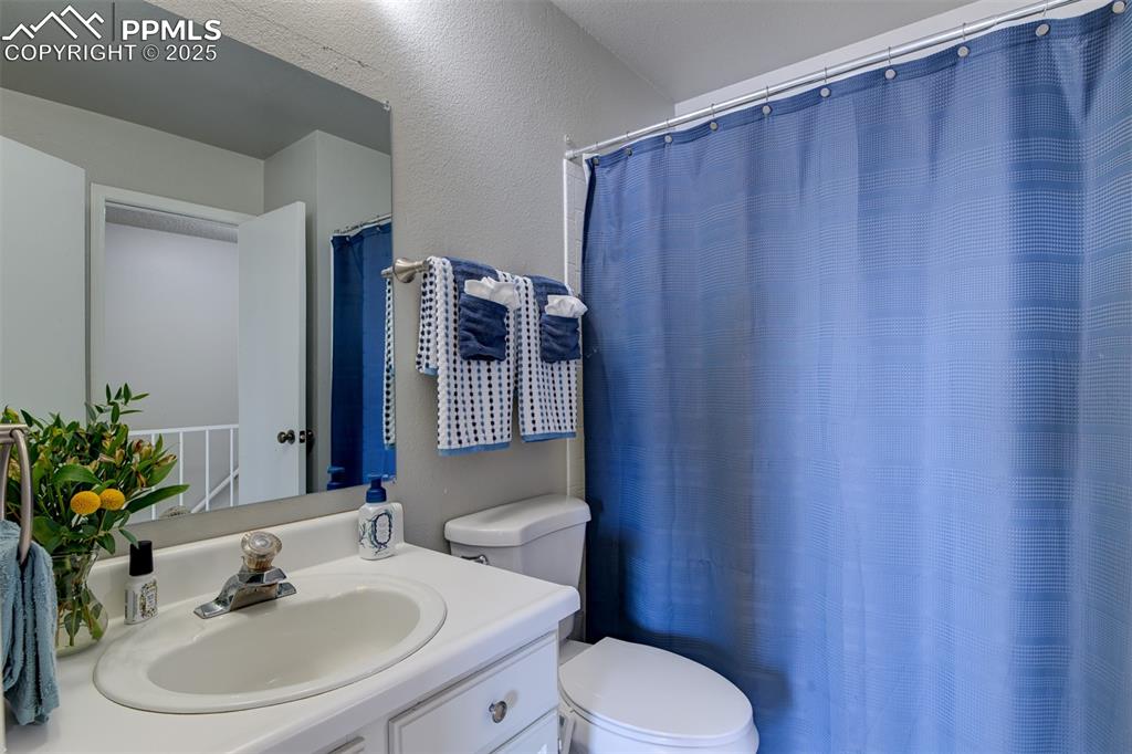 Image 19 of 34: Full Bathroom Upstairs - Adjoins with Primary Bedroom.