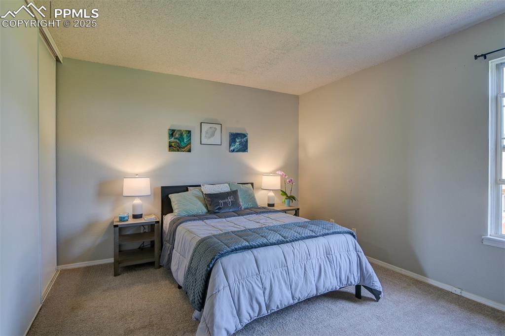 Image 20 of 34: Secondary Upstairs Bedroom