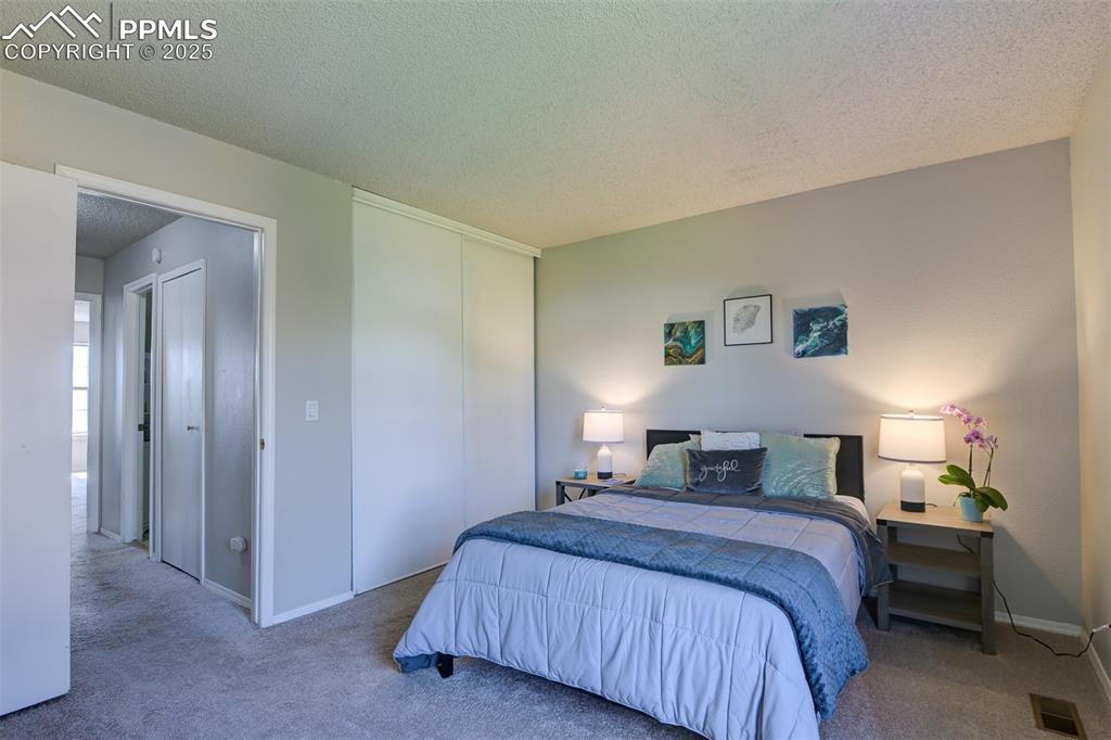 Image 21 of 34: Secondary Upstairs Bedroom