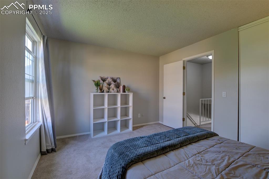 Image 22 of 34: Secondary Upstairs Bedroom