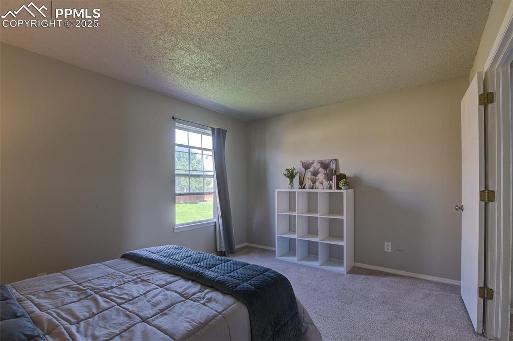 Image 23 of 34: Bedroom