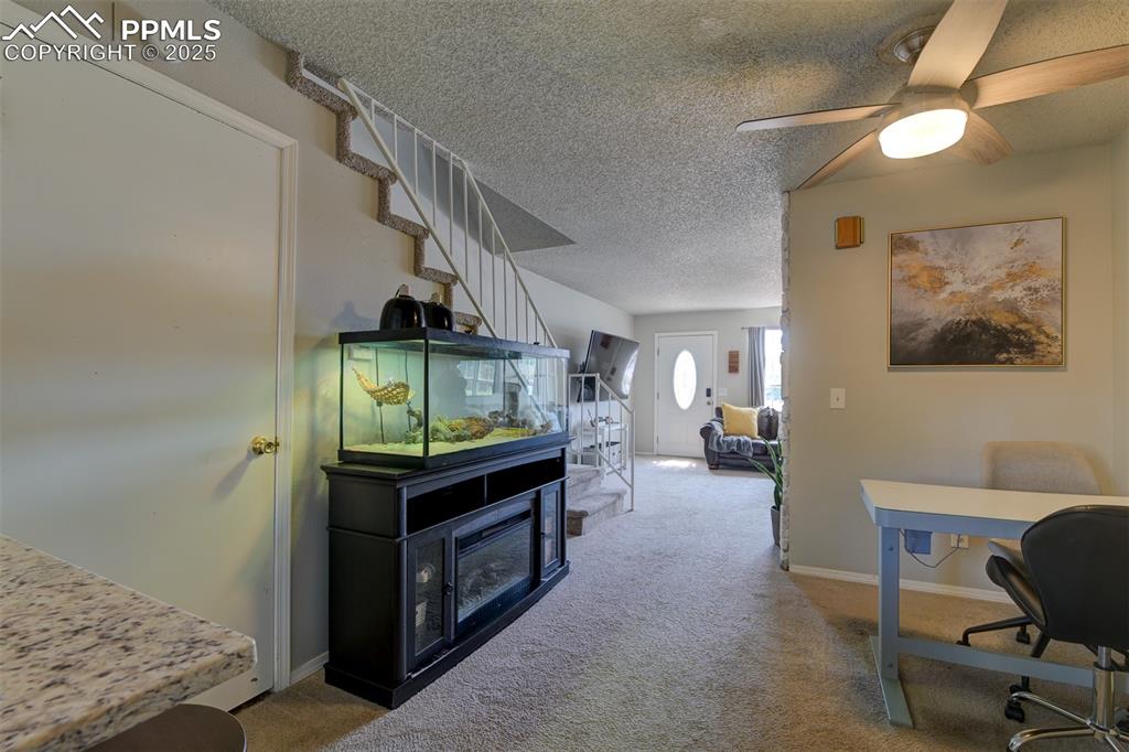 Image 7 of 34: View from Kitchen back to dining and living areas.