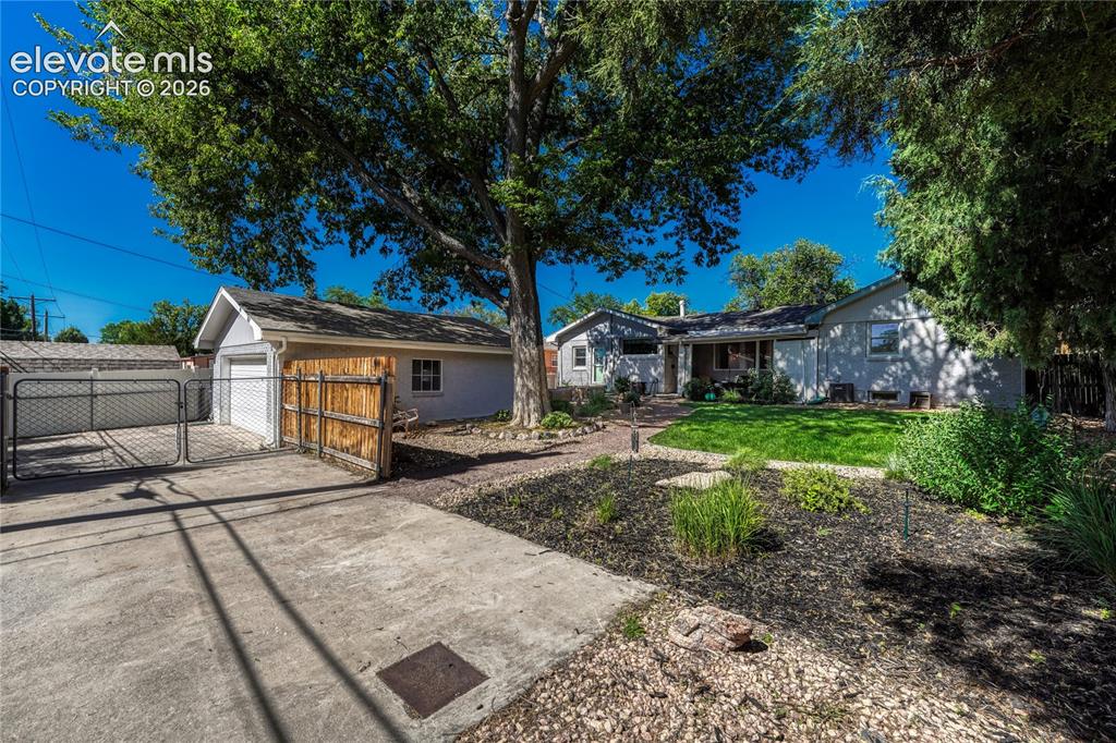 Image 38 of 45: Backyard & detached garage