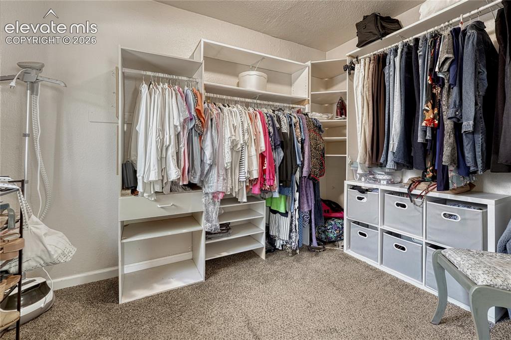 Image 9 of 45: Primary walk-in closet