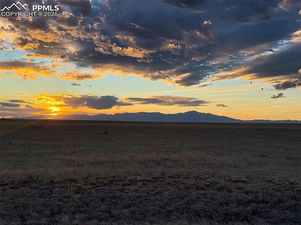 Image 7 of 8: Sunset Over the Plains
Dramatic evening skies stretch across the acreage, 