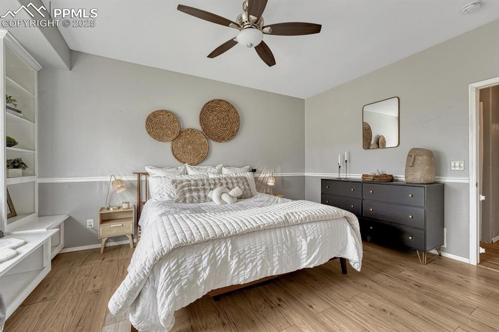 Image 19 of 47: Main level primary bedroom.