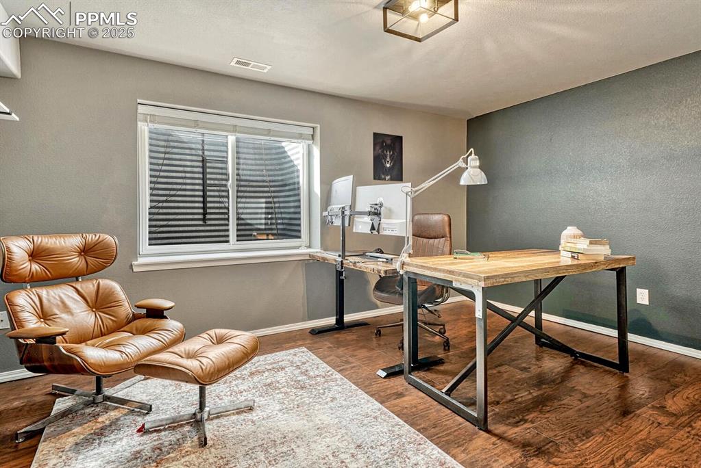 Image 30 of 47: Basement bedroom, one of two. 