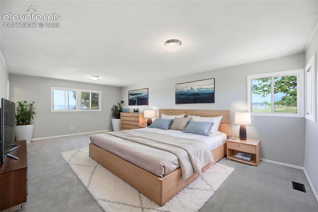Image 16 of 48: Carpet, Dual Closets, Primary Bath, Large Room, Windows All Around