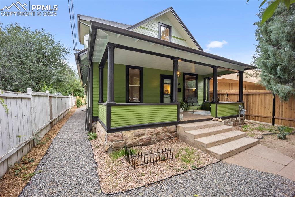 Image 2 of 48: View of house with porch