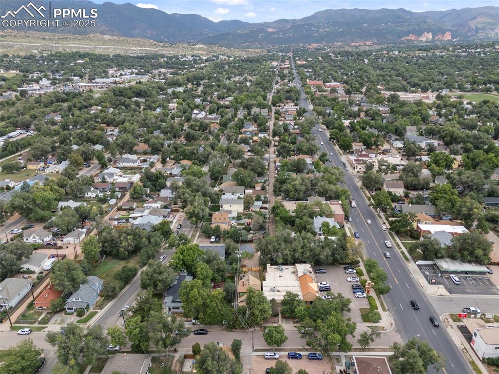 Image 48 of 48: Aerial view of residential area with mountains