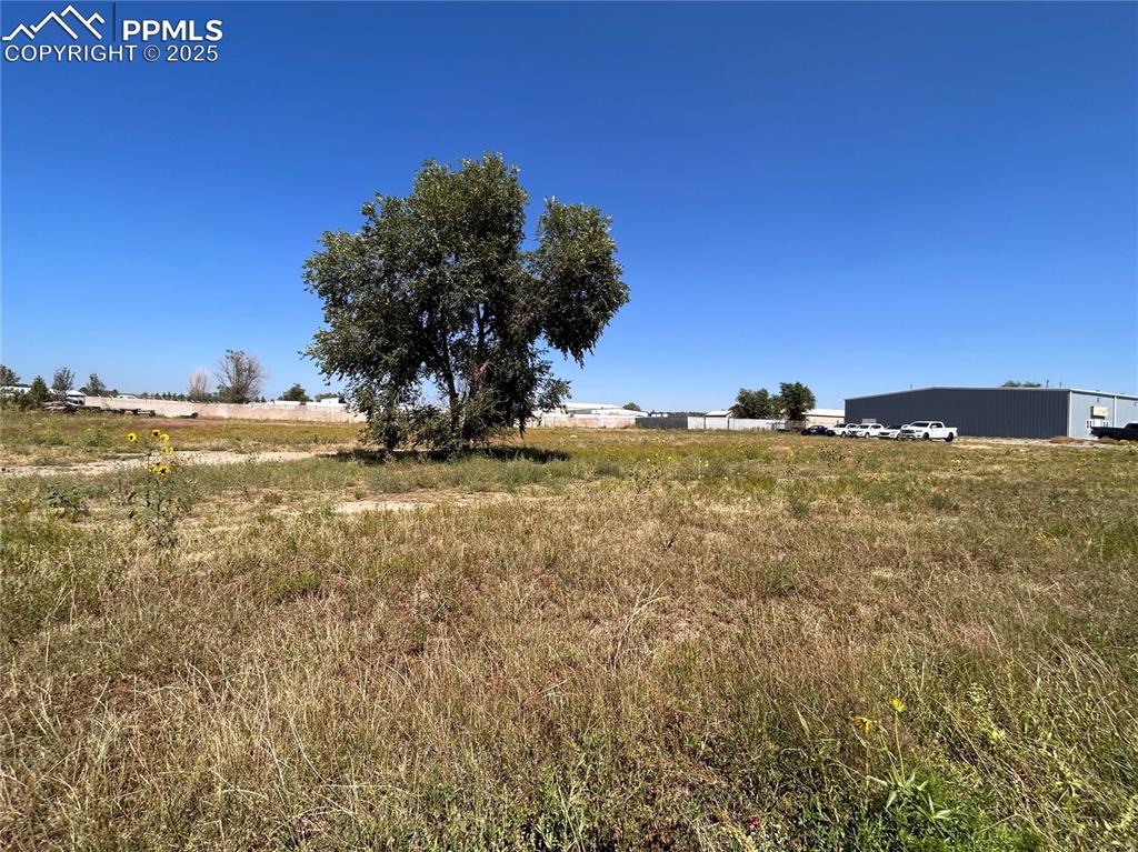 Image 2 of 5: View of yard with a rural view