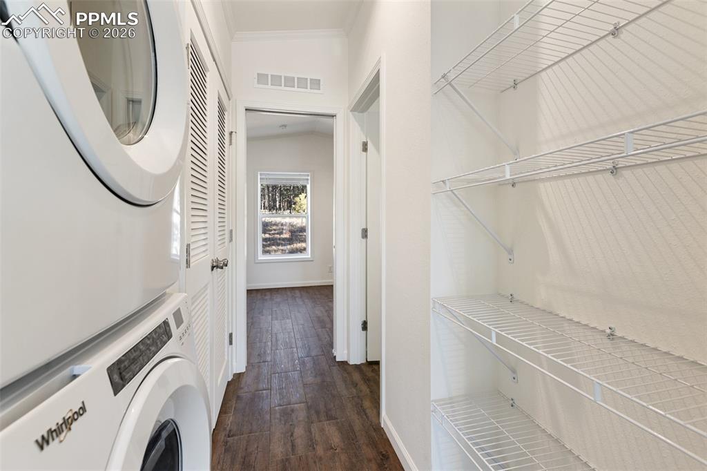 Image 10 of 19: Hallway, laundry.