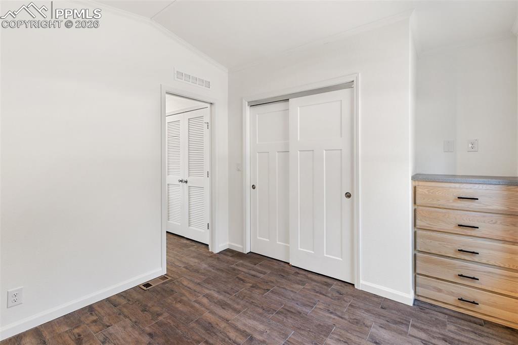 Image 14 of 19: Bedroom , closet and built in.