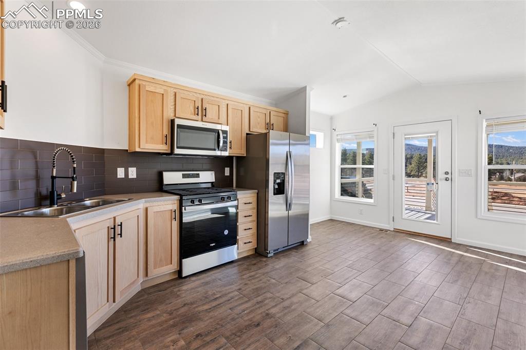 Image 9 of 19: Kitchen and Living Room