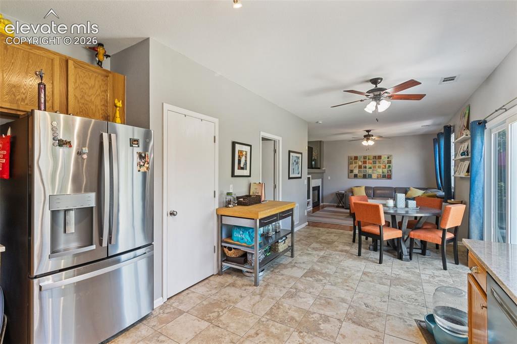 Image 10 of 39: Looking at dining area from kitchen.