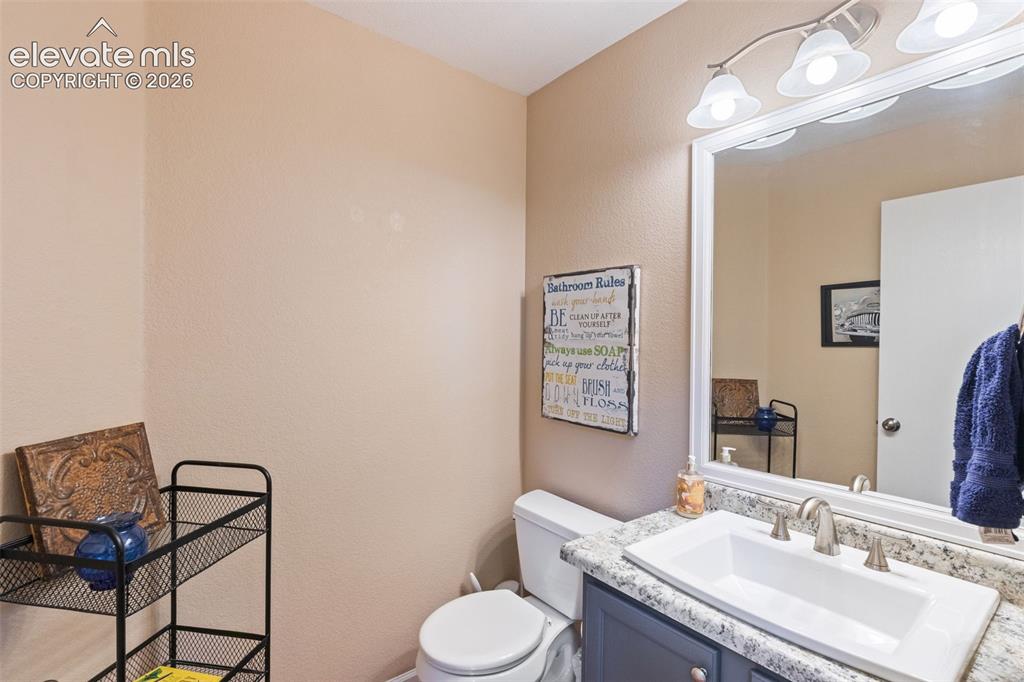 Image 8 of 39: Powder room.