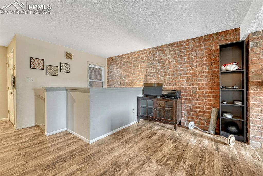 Image 13 of 48: Bonus area off the living room. Use as an office or a workout area.